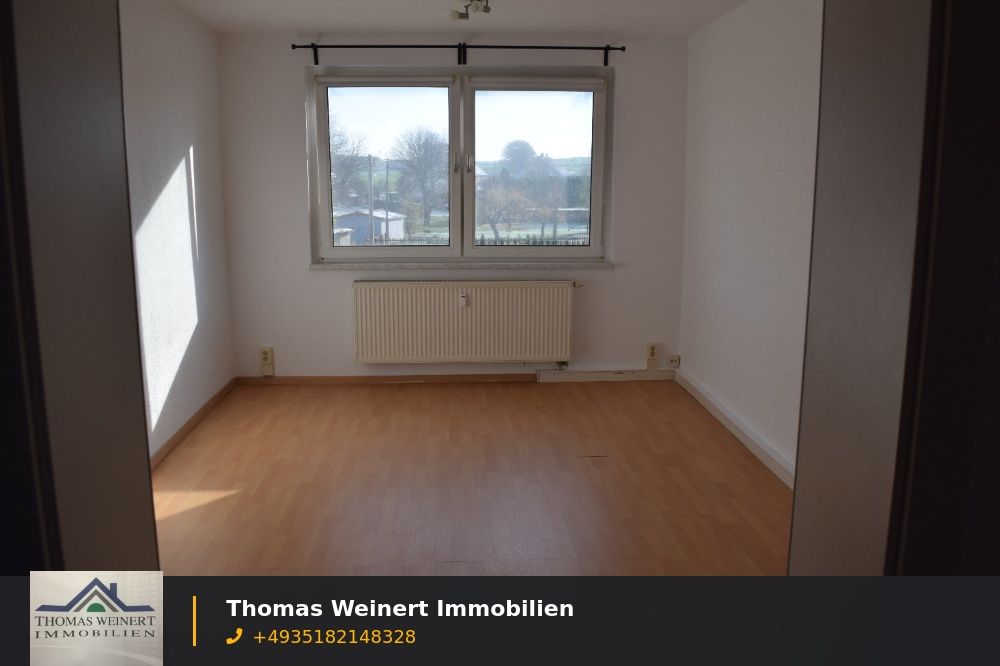 Einraumwohnung mit Einbauküche und PKW Stellplatz in Grüner Lage